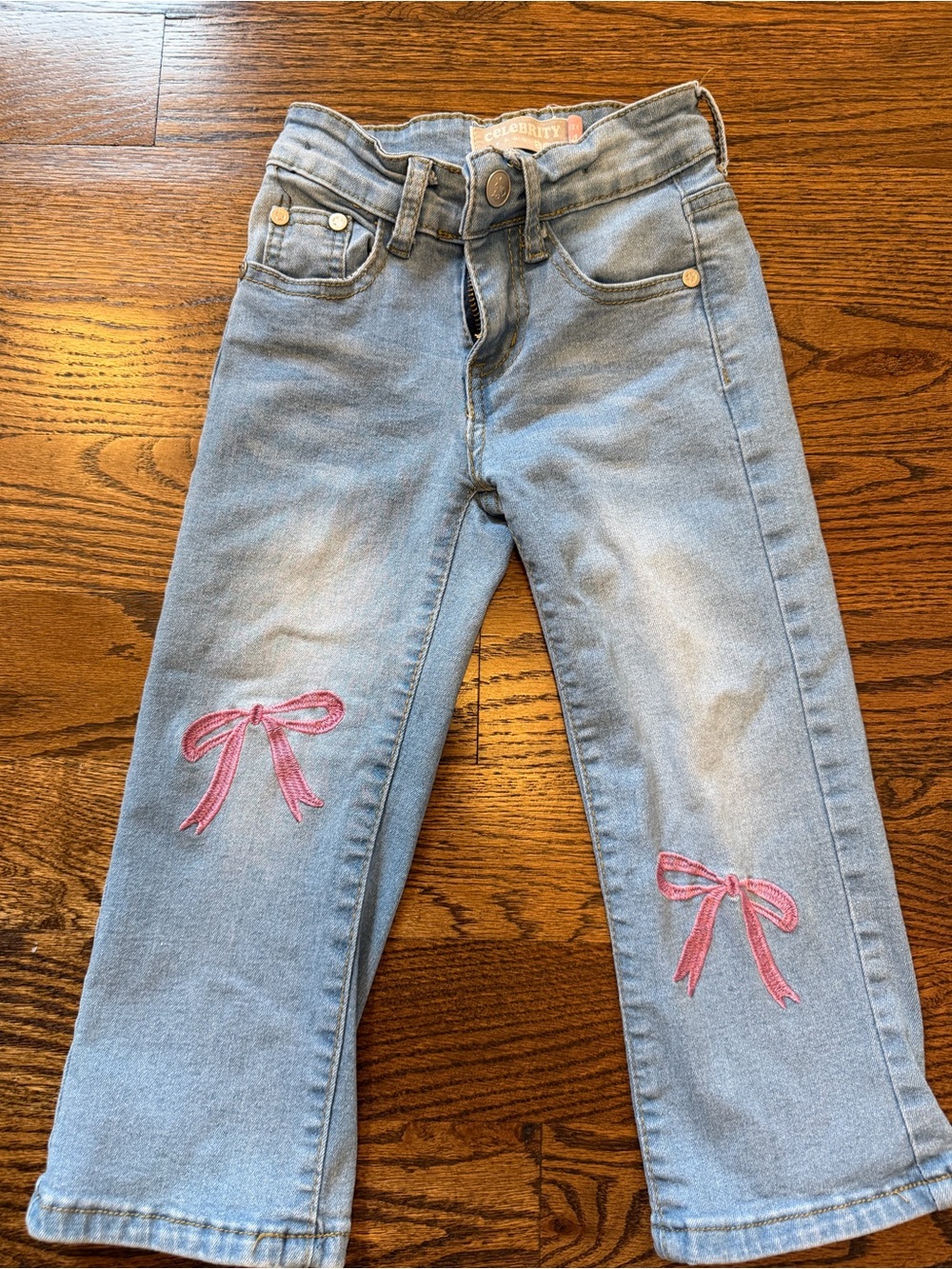 Like new! Girls jeans with bow detail